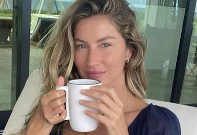 Grávida, Gisele Bündchen esbanja barriguinha durante evento