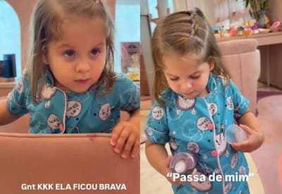 Maria Flor encanta ao se maquiar e passar perfume antes de dormir