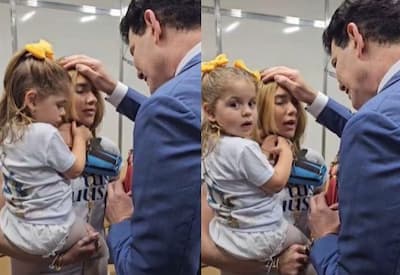 Virginia recebe bênção de Padre Reginaldo Manzotti após a separação