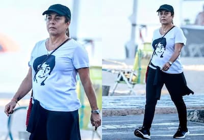 Cissa Guimarães caminha no Leblon com camiseta em homenagem ao filho Rafael