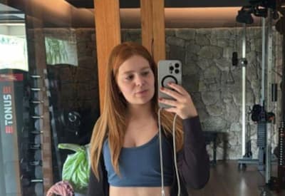Viih Tube ostenta barriga reta durante treino após cirurgia