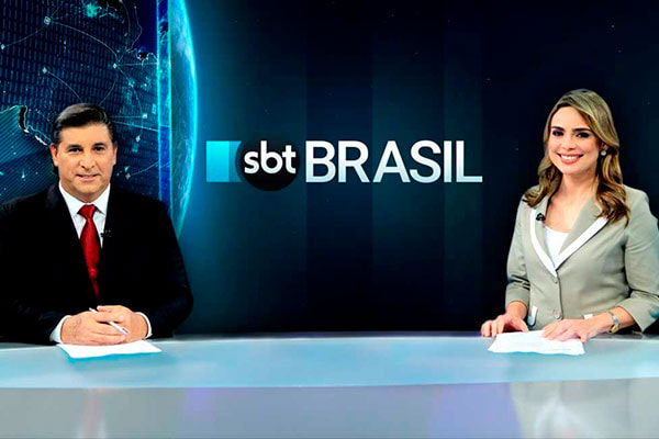 Os âncoras do telejornal SBT Brasil, Carlos Nascimento e Rachel Sheherazade