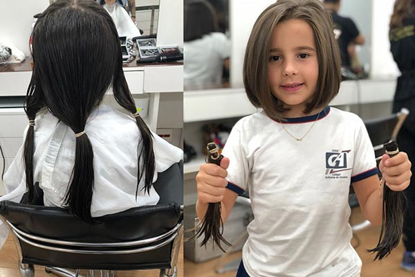 menina com o cabelo cortado