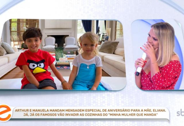 Apresentadora Eliana assistindo aos filhos