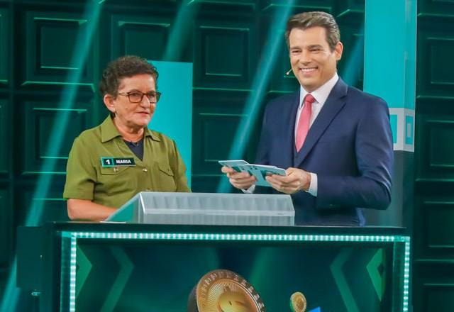 Celso Portiolli e a participante Maria