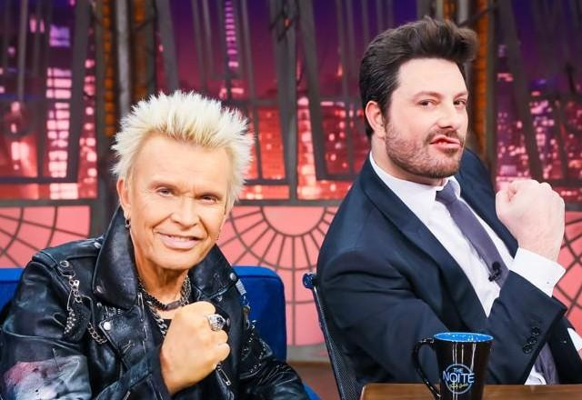 Billy Idol e Danilo Gentili posam juntos para foto.