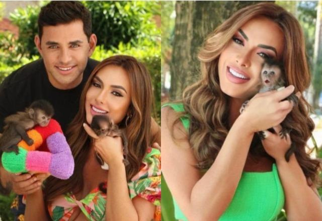 Nicole Bahls e Marcelo Viana posam com bebês macacos