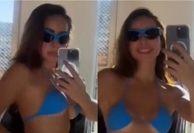 Print de vídeo de Sabrina Sato usando um biquíni azul em frente ao espelho