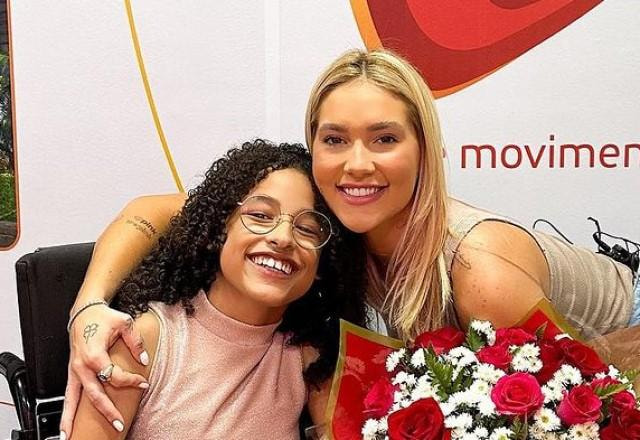 Virginia Fonseca com paciente da AACD