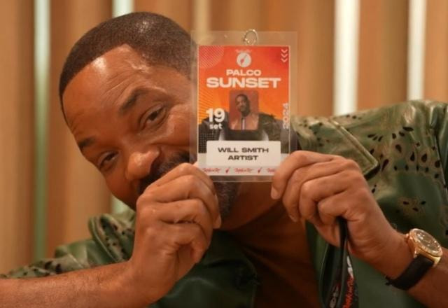 Foto do cantor Will Smith com a identificação do Rock in Rio no rosto