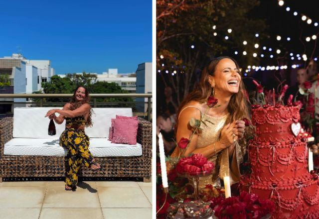 Viviane Araújo ri ao lado do seu bolo de aniversário.